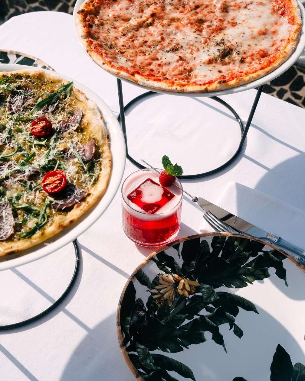 pizza food dining meals mediterranean-recipes-gourmet-sauces-vegetables african queen dubai